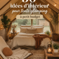 Tente de glamping élégamment décorée avec des coussins et des lumières.