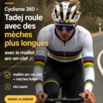 Tadej Pogačar portant son maillot arc-en-ciel lors d'une compétition de cyclisme.